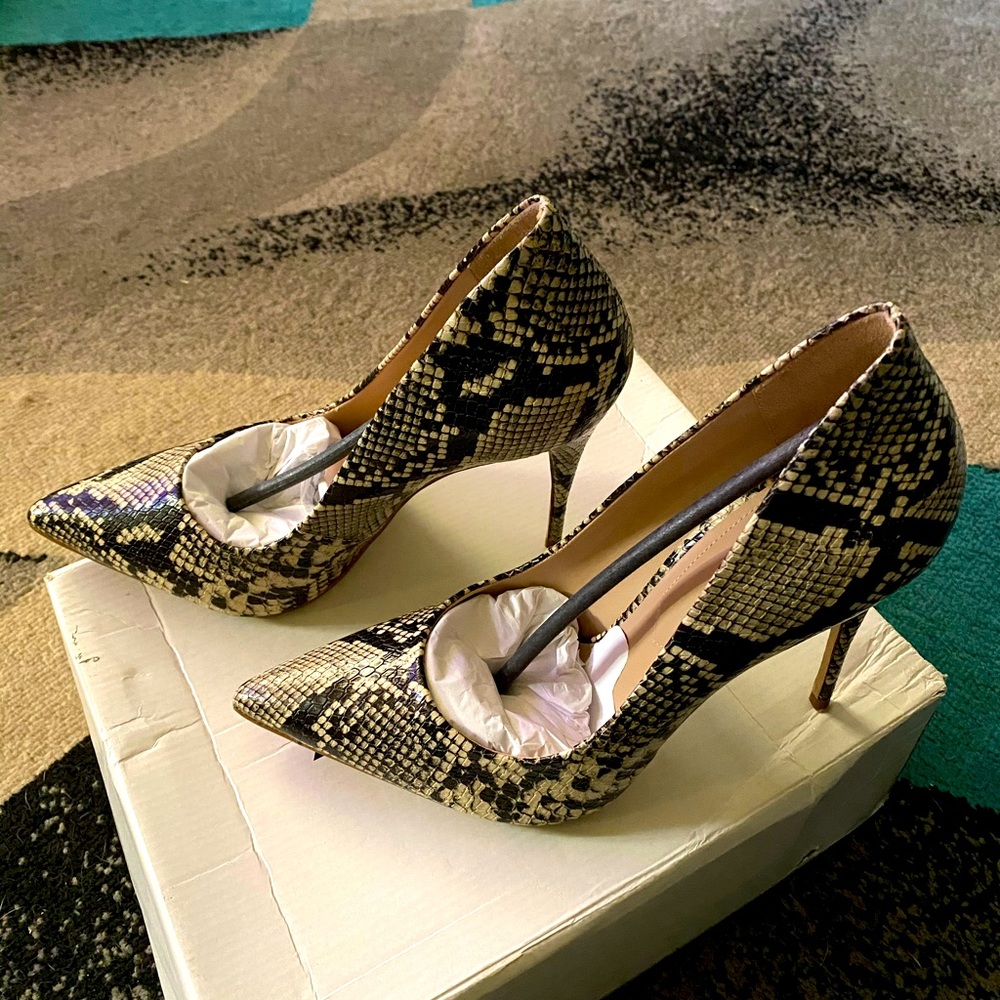 Brand new Aldo Stessy snake skin. Size 9 heels.